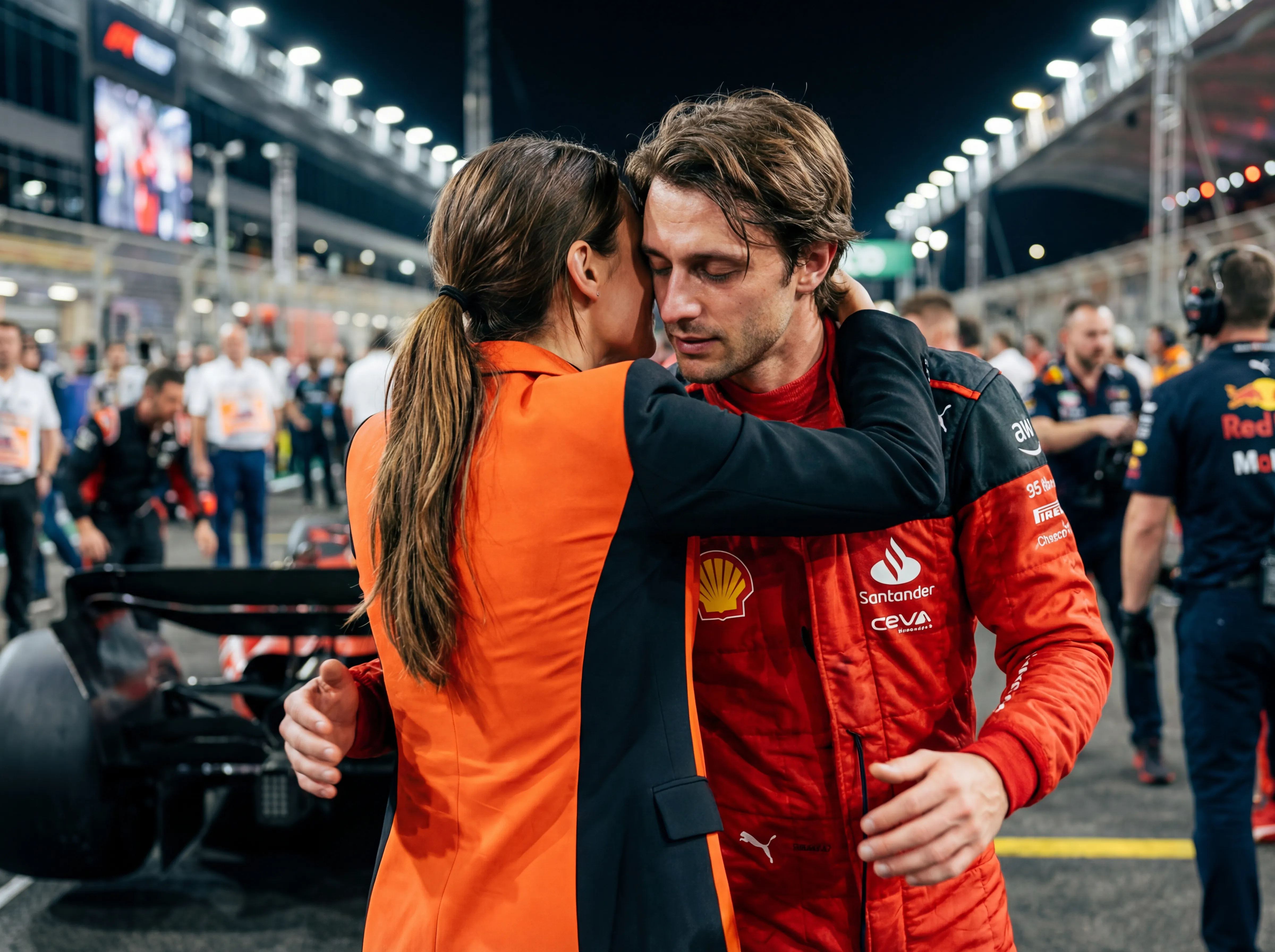 Alexander's manager, Amy Millie, imparts words of encouragement to Alexander before the start of the 2025 Quatar Grand Prix